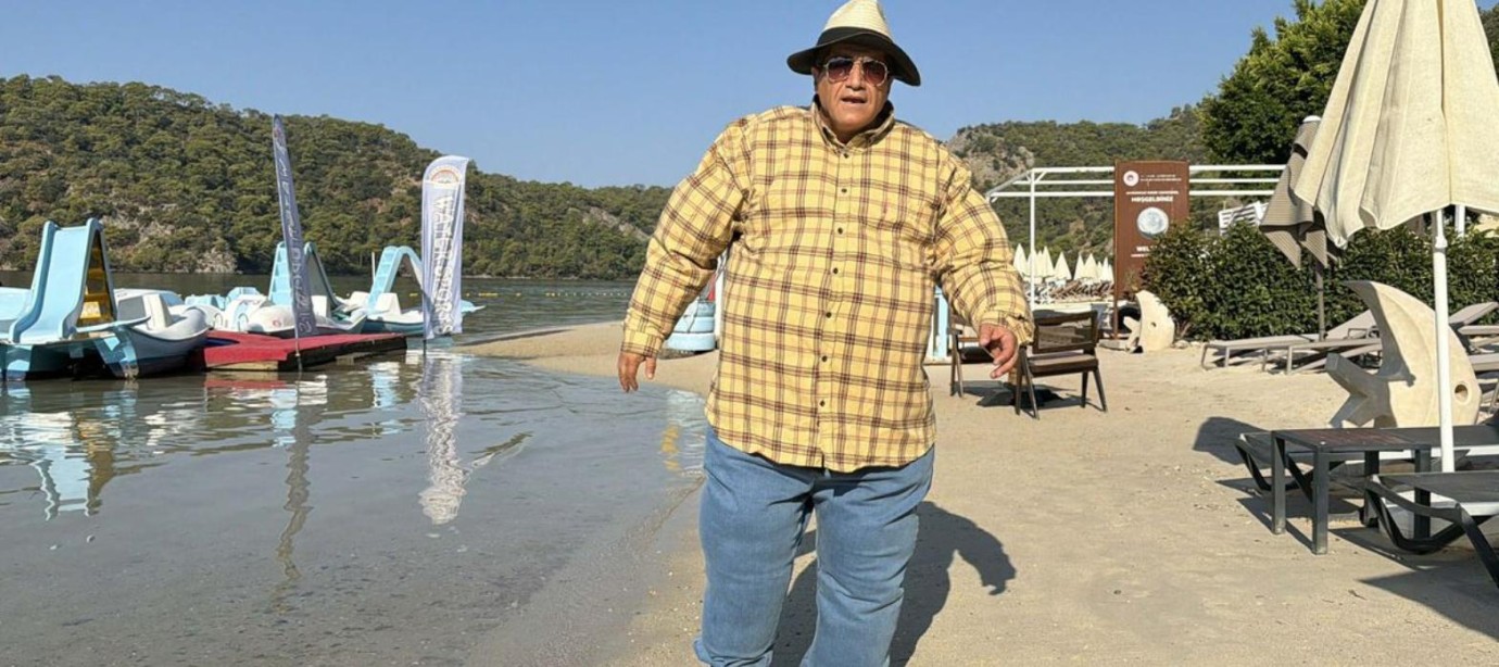 Aydın Aydın'dan Ölüdeniz'de şişme kıyafetli israf mesajı