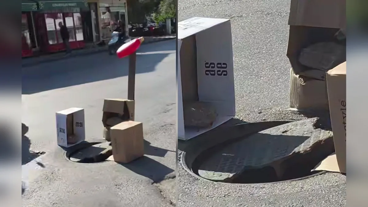 Kırık logar kapağının çevresine konulan karton kutular