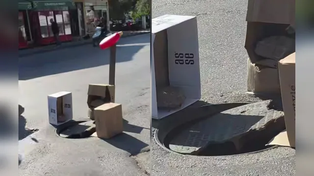 Kırık logar kapağının çevresine konulan karton kutular